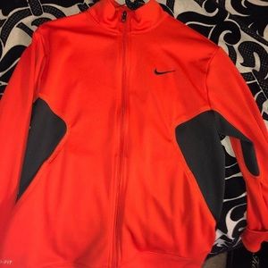 Orange/ reddish Nike jacket sz medium/Lg